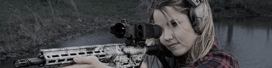 A shooter using ear protection